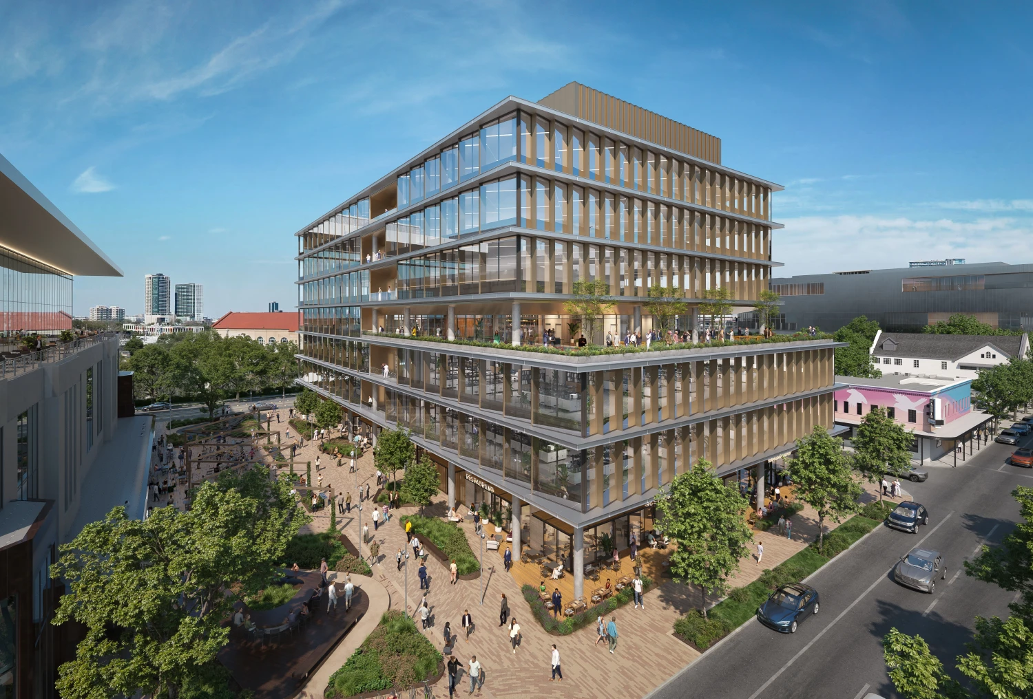Aerial view of The ARC with busy outdoor plaza and surrounding downtown skyline